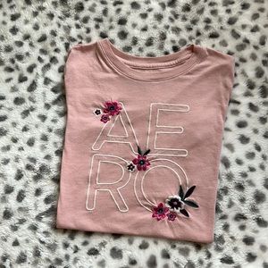 This is a pink Aeropostale shirt size small